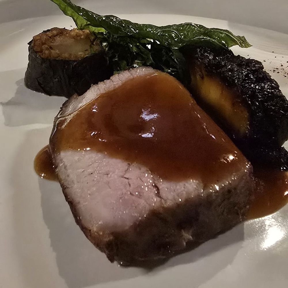 Counter- - Pork Loin w grilled pineapple, dirty rice roll w homemade sausage - New American Near Me - Charlotte, North Carolina