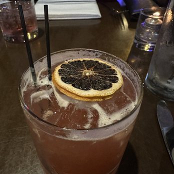 Hootch and Banter - This is called "JUST PEACHY". One of many finely crafted cocktails offered on their extensive menu. - New American Near Me - Frederick, Maryland
