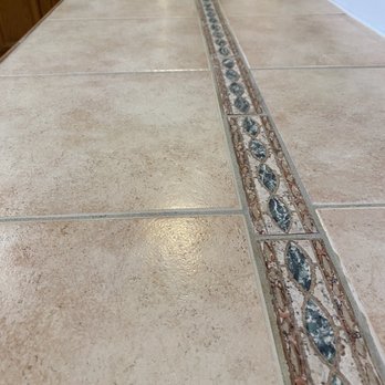 Higher Ground Cleaning Services - Tile clean on the counter.  Such a difference. Beautiful - Carpet Cleaning Near Me