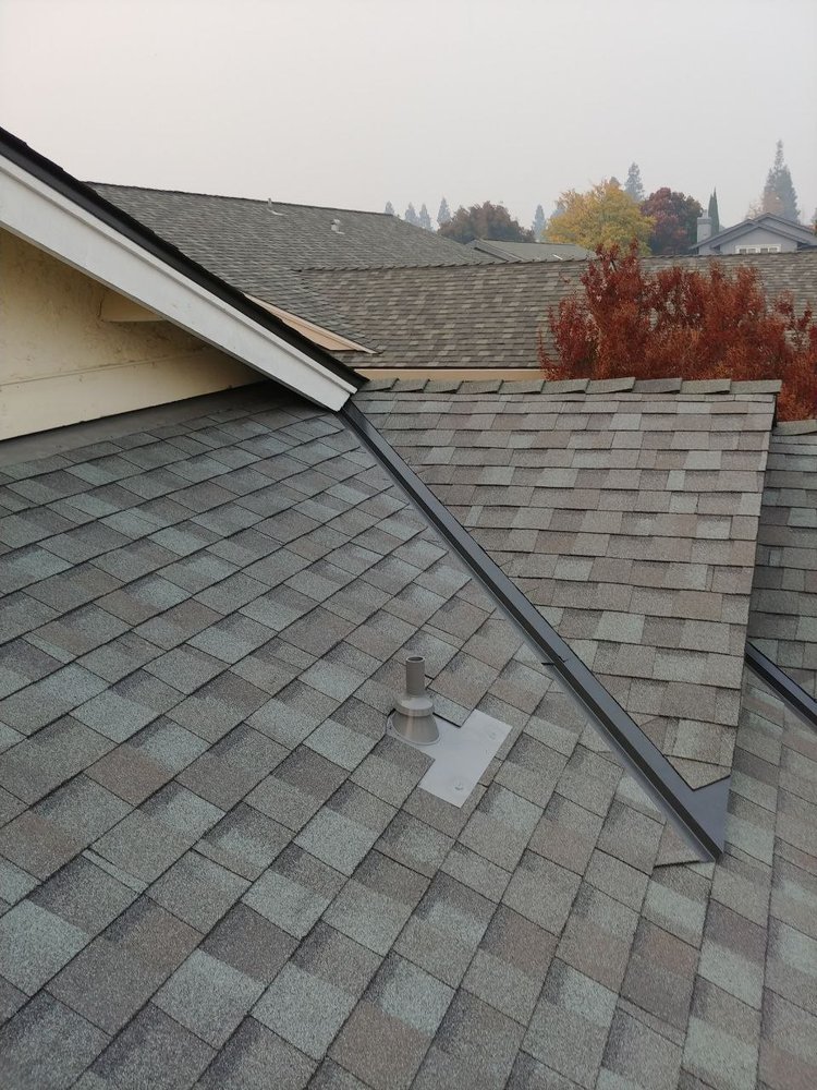 Slide of VIK Quality Roofing