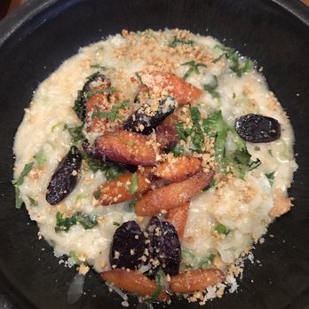 The Wolf - Carrot risotto (only vegetarian enteee) with pea shoots - New American Near Me - Oakland, California The Wolf - Carrot risotto (only vegetarian enteee) with pea shoots - New American Near Me - Oakland, California