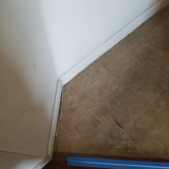 National Flooring Group - Just ONE of the spaces where they ripped up the floor but did not replace the caulk - Flooring Near Me - Las Vegas, Nevada National Flooring Group - Just ONE of the spaces where they ripped up the floor but did not replace the caulk - Flooring Near Me - Las Vegas, Nevada