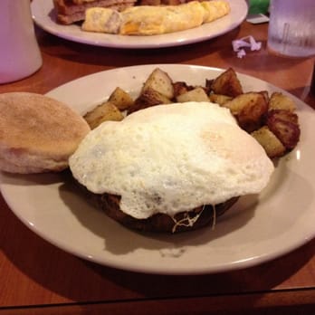 Cool Moose Cafe - Portabella stuffed mushroom with spinach, garlic, onions, tomatoes topped with two eggs, side of home fries and bread of choice. - Breakfast & Brunch Near Me - Jacksonville, Florida