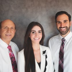 A Dental Care 24 Hrs - Our Doctors! Drs. Dennis, Adrina, and Christopher.