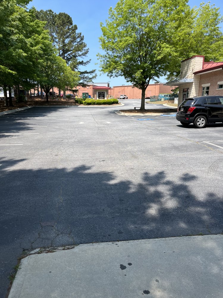 Slide of A1 Seal Coating and Roofing