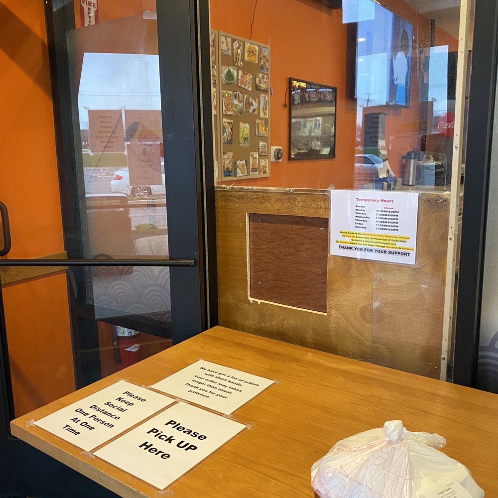 Hachi Sushi - a table with a bag of food on it - Japanese Near Me - Loves Park, Illinois
