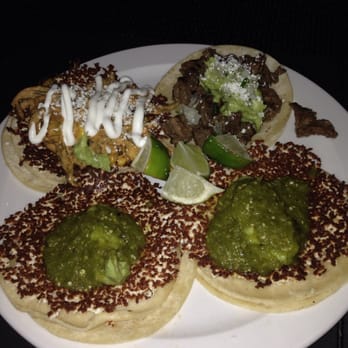 Tacos Tequila Whiskey - Our tacos- 2 ala planchas in front, taco estilo Abril back left, Asada back right - Whiskey Bars Near Me - Denver, Colorado Tacos Tequila Whiskey - Our tacos- 2 ala planchas in front, taco estilo Abril back left, Asada back right - Whiskey Bars Near Me - Denver, Colorado