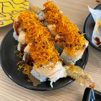 Sushi Aboard - a plate of food on a table - Japanese Near Me - Vancouver, British Columbia