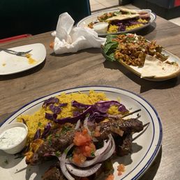 Mixed grill, chicken lettuce wrap, and chicken shawarma plates. Not pictured is a dish called muhammarah, great appetizer to start. Mixed grill, chicken lettuce wrap, and chicken shawarma plates. Not pictured is a dish called muhammarah, great appetizer to start.