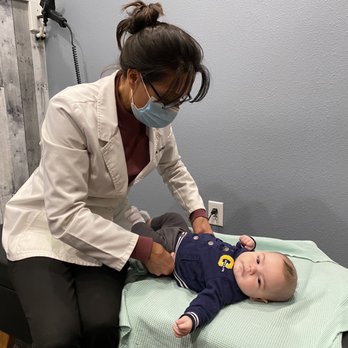 Salud Chiropractic - My newborn getting adjusted by Dr. Farrell. - Chiropractors Near Me - Rohnert Park, California