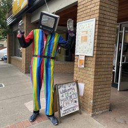 Community Media Center Of Marin - Media Man greets passers by with his TV head.