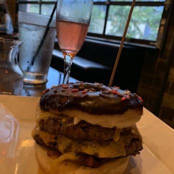 Bosscat Kitchen & Libations - Donut burger uniting two favorites into a yummy brunch staple. Pairs well with jalapeño mayo. - New American Near Me - Houston, Texas Bosscat Kitchen & Libations - Donut burger uniting two favorites into a yummy brunch staple. Pairs well with jalapeño mayo. - New American Near Me - Houston, Texas