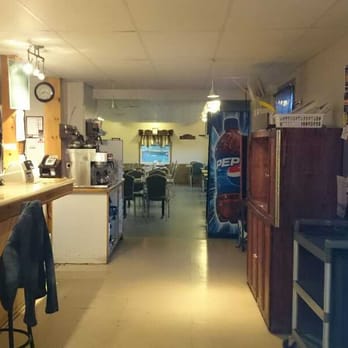 Restaurant Chez Ron - a view of the kitchen and dining area - Diners Near Me - Gaspe, Quebec Restaurant Chez Ron - a view of the kitchen and dining area - Diners Near Me - Gaspe, Quebec