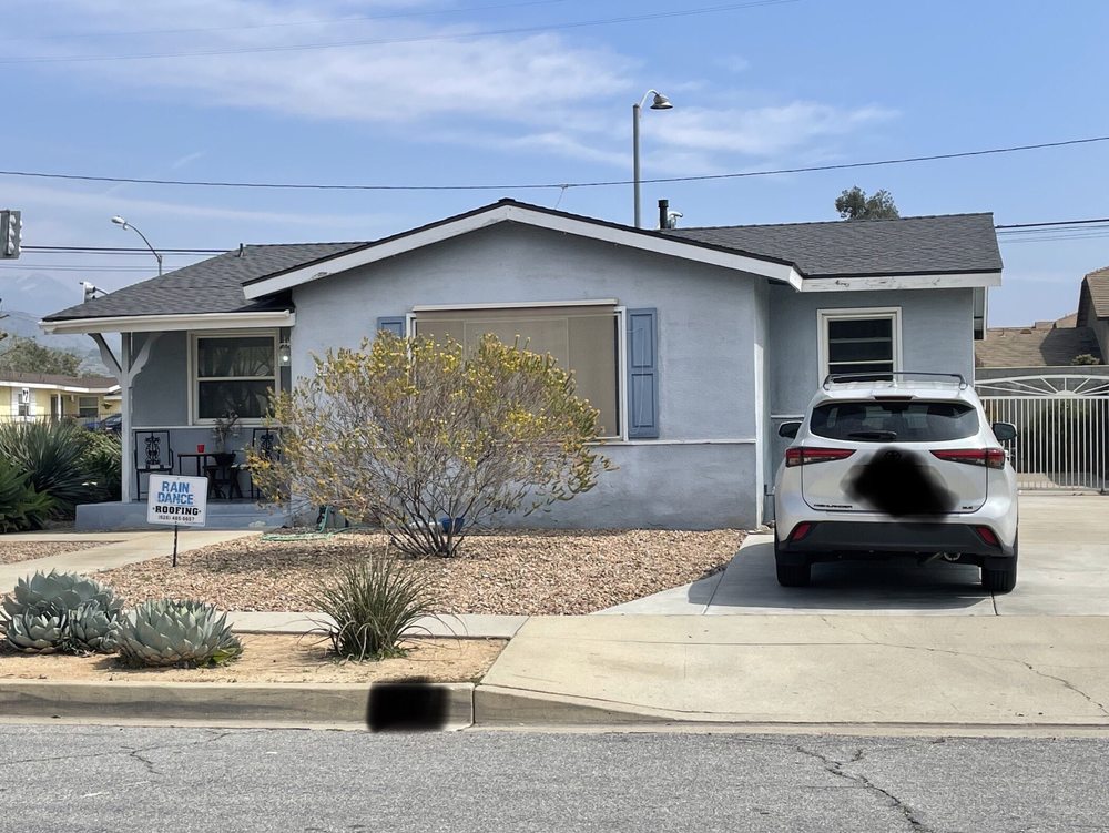 Slide of Rain Dance Roofing