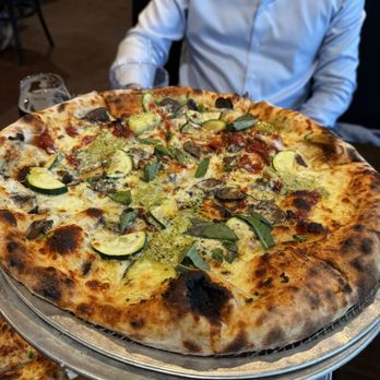Zoli's NY Pizza - Round Prince Rogers - Pizza Near Me - Addison, Texas Zoli's NY Pizza - Round Prince Rogers - Pizza Near Me - Addison, Texas