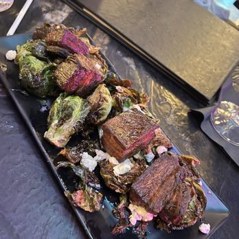 82 Degrees - Steak tips with Brussels sprouts - Seafood Near Me - St. Pete Beach, Florida