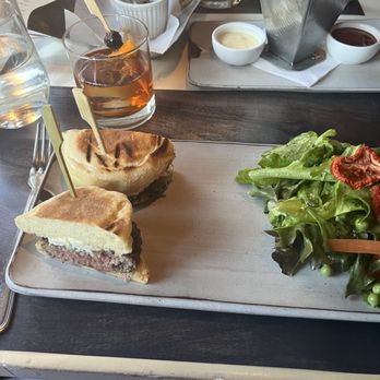Joseph's Culinary Pub - N.M. Lamb Burger with Green Chile & Sheep's Milk Cheese - New American Near Me - Santa Fe, New Mexico