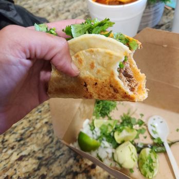 Taco Vida - Birriera taco with cilantro and onion on the side. A Dipped this baby in the ramen and I was hooked. - Tacos Near Me - Richland Hills, Texas Taco Vida - Birriera taco with cilantro and onion on the side. A Dipped this baby in the ramen and I was hooked. - Tacos Near Me - Richland Hills, Texas