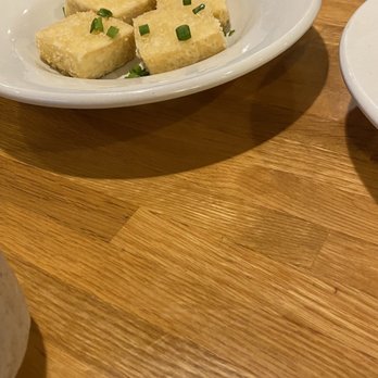 Kanpai - two plates of food on a wooden table - Japanese Near Me - Savannah, Georgia