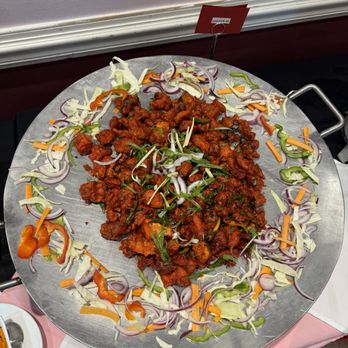 India Palace - A hot and spicy dish. Beautiful presentation. - Indian Near Me - Germantown, Maryland India Palace - A hot and spicy dish. Beautiful presentation. - Indian Near Me - Germantown, Maryland