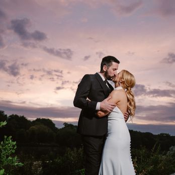 Mindy Joy Photography - Bride and groom portrait with a sunset. - Event Photography Near Me Mindy Joy Photography - Bride and groom portrait with a sunset. - Event Photography Near Me