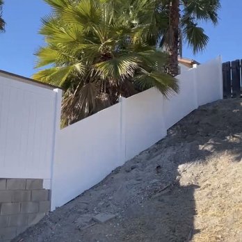 Supreme Fence - After new installation of total 92' ft white vinyl fence that continued hillside - Fences & Gates Near Me Supreme Fence - After new installation of total 92' ft white vinyl fence that continued hillside - Fences & Gates Near Me
