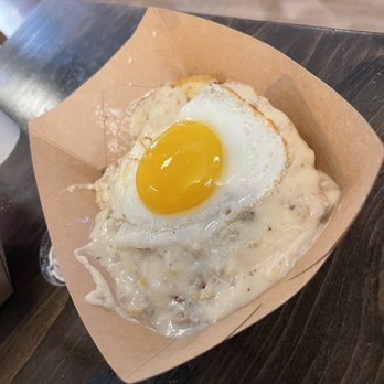 The Biscuit Bar - Biscuits n gravy topped with an egg, just okay. - Breakfast & Brunch Near Me - Plano, Texas The Biscuit Bar - Biscuits n gravy topped with an egg, just okay. - Breakfast & Brunch Near Me - Plano, Texas