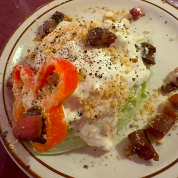 Bonge's Tavern - Wedge Salad with blue cheese and candied pork belly. - New American Near Me - Perkinsville, Indiana