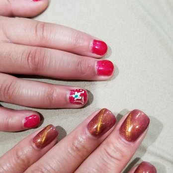Athena NaiL Bar - Red Gel nails on the left by Kevin, Cat eyes on the right done by Rose. - Nail Salons Near Me - Blaine, Minnesota Athena NaiL Bar - Red Gel nails on the left by Kevin, Cat eyes on the right done by Rose. - Nail Salons Near Me - Blaine, Minnesota