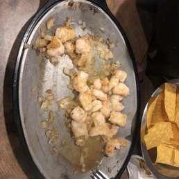 a bowl of chips and a bowl of shrimp
