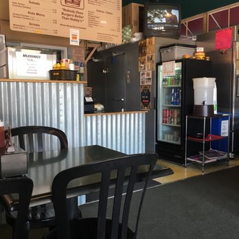 Nobby's - Small dining area w/flimsy plastic chairs and a total of five tables. They do have sodas available in cans as well as water bottles. - Burgers Near Me - Chico, California Nobby's - Small dining area w/flimsy plastic chairs and a total of five tables. They do have sodas available in cans as well as water bottles. - Burgers Near Me - Chico, California