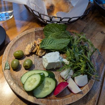 Yalda - Atlanta - Sabzi Khordan (سبزی خوردن) and naan. Green olives, walnuts, basil, tarragon, radish, cucumbers, and cheese. Yum. - Middle Eastern Near Me - Atlanta, Georgia