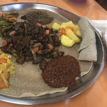 Enatye Ethiopian Restaurant - Beef Derek Tibs surrounded by 5 veggie combo - Ethiopian Near Me - Herndon, Virginia Enatye Ethiopian Restaurant - Beef Derek Tibs surrounded by 5 veggie combo - Ethiopian Near Me - Herndon, Virginia