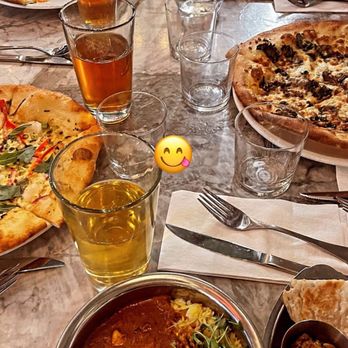 Earls Kitchen + Bar - Happy hour pizza and tikka masala yum! - Canadian (New) Near Me - Burnaby, British Columbia