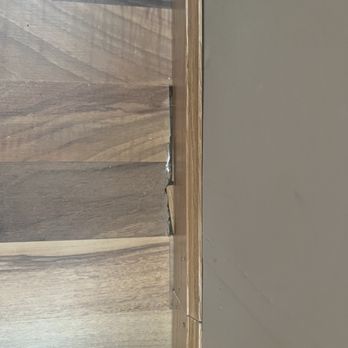 ForSure Flooring - As we started installing the baseboards we found a few areas where the cuts were not consistent and difficult to cover. - Flooring Near Me ForSure Flooring - As we started installing the baseboards we found a few areas where the cuts were not consistent and difficult to cover. - Flooring Near Me