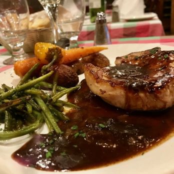 Café de Paris - Quebec Pork Chop in maple sauce with veggies - Italian Near Me - Quebec City, Quebec Café de Paris - Quebec Pork Chop in maple sauce with veggies - Italian Near Me - Quebec City, Quebec