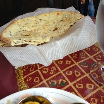 Royal Southern Kitchen - Special order peshwari naan... Filled with raisins, pine nuts, and other sweet things. - Indian Near Me - Winter Park, Florida
