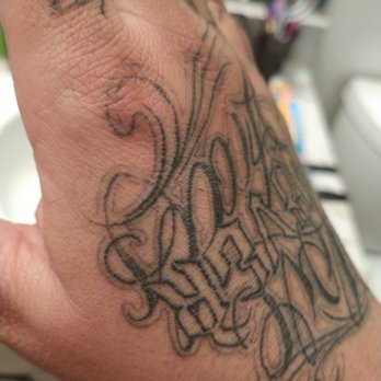 Lucky You Tattoo - You can see the lines fading in and out the scarring on the number how the skin rises - Tattoo Near Me - Manteca, California