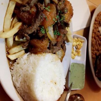 Riko Peruvian Cuisine - Lomo saltedo (beef + fries + rice) - Peruvian Near Me - Jamaica, New York Riko Peruvian Cuisine - Lomo saltedo (beef + fries + rice) - Peruvian Near Me - Jamaica, New York