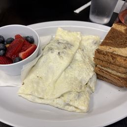 Egg white omelet with Brie and bacon and a side of fresh fruit
