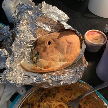 Roma's Italian Restaurant - Sausage, pepperoni, and jalapeño calzone... along with Chicken Milaneze... - Italian Near Me - Beeville, Texas Roma's Italian Restaurant - Sausage, pepperoni, and jalapeño calzone... along with Chicken Milaneze... - Italian Near Me - Beeville, Texas