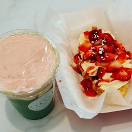 Matcha with strawberry cream top and strawberry croffle Matcha with strawberry cream top and strawberry croffle