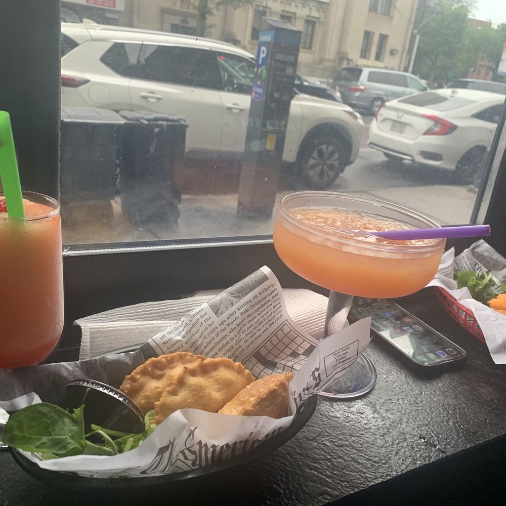 Nostrand Station Bar & Lounge - Rum punches (frozen and regular) Shrimp and jerk chicken empanadas - Bars Near Me - Brooklyn, New York Nostrand Station Bar & Lounge - Rum punches (frozen and regular) Shrimp and jerk chicken empanadas - Bars Near Me - Brooklyn, New York