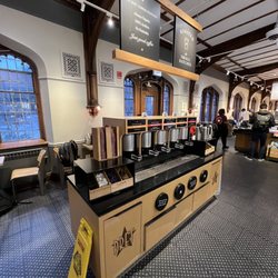 Pret A Manger - The coffee station- you pour your own coffee and then add cream and lid