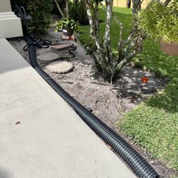 Abel Gutter Service - Ugly tube in front of my home that he denied installing but finally admitted to doing after months of trying to get it to look better.