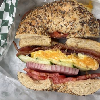 Leon’s Bagels - Everything bagel with bacon, egg, cheese, cucumber, red onion and tomatoes - Bagels Near Me - New York, New York Leon’s Bagels - Everything bagel with bacon, egg, cheese, cucumber, red onion and tomatoes - Bagels Near Me - New York, New York