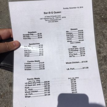 Bar-B-Q Queen - ows a person holding a menu - Barbeque Near Me - Clearwater, Florida Bar-B-Q Queen - ows a person holding a menu - Barbeque Near Me - Clearwater, Florida