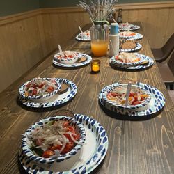 Tacoma Banya - Salad with tomatoes, cucumbers, ans onions.