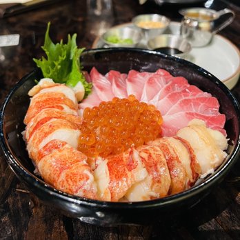 XO Restaurant - Seafood Chirashi Two 5 oz Butter Poached Lobster Tails 6 oz Hamachi Sashimi 2 oz Marinated Ikura $85 supplemental charge  Best dish - Asian Fusion Near Me - Honolulu, Hawaii