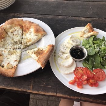 Cafe Reyes - Cheesy bread and mozzarella salad for appetizers. So amazing! - Pizza Near Me - Point Reyes Station, California